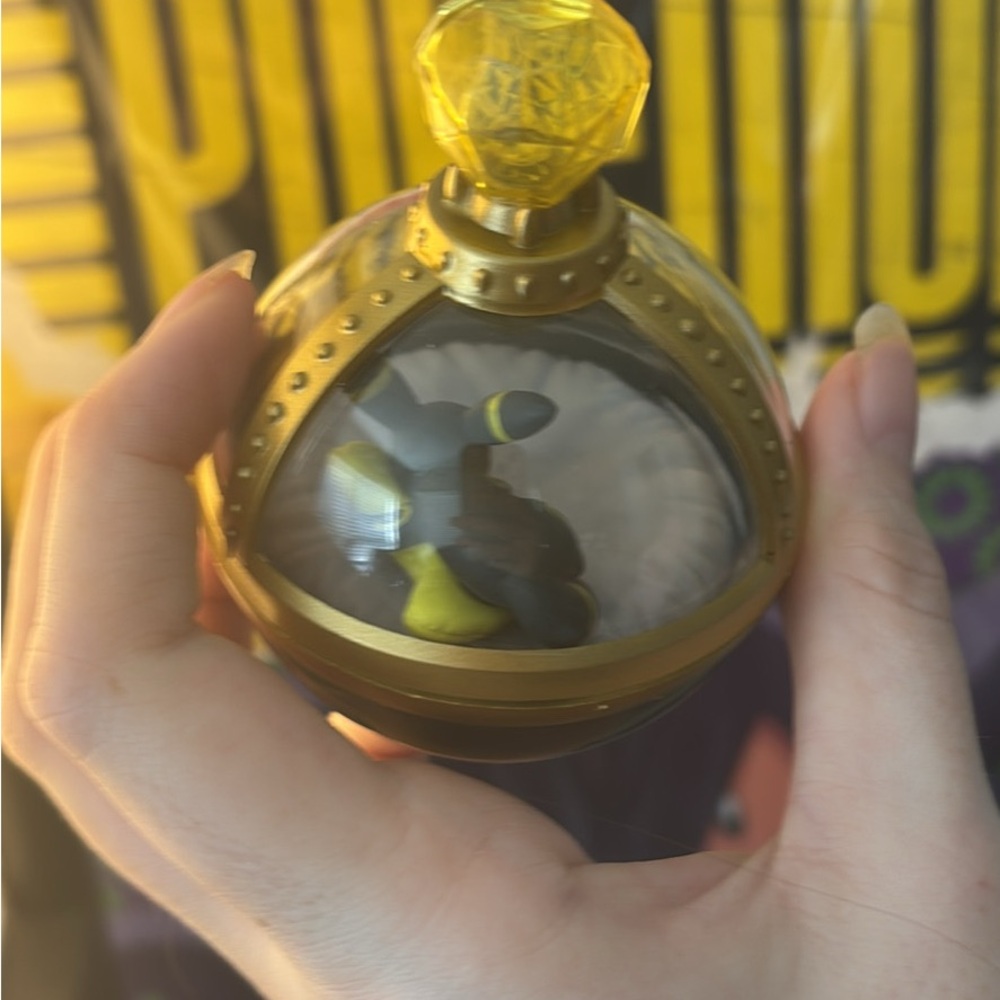 Gold and Black Spherical Perfume Bottle